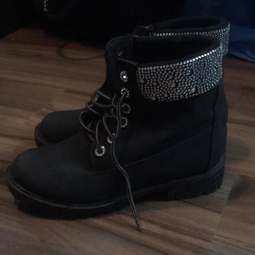 Black rhinestone detailed boots.